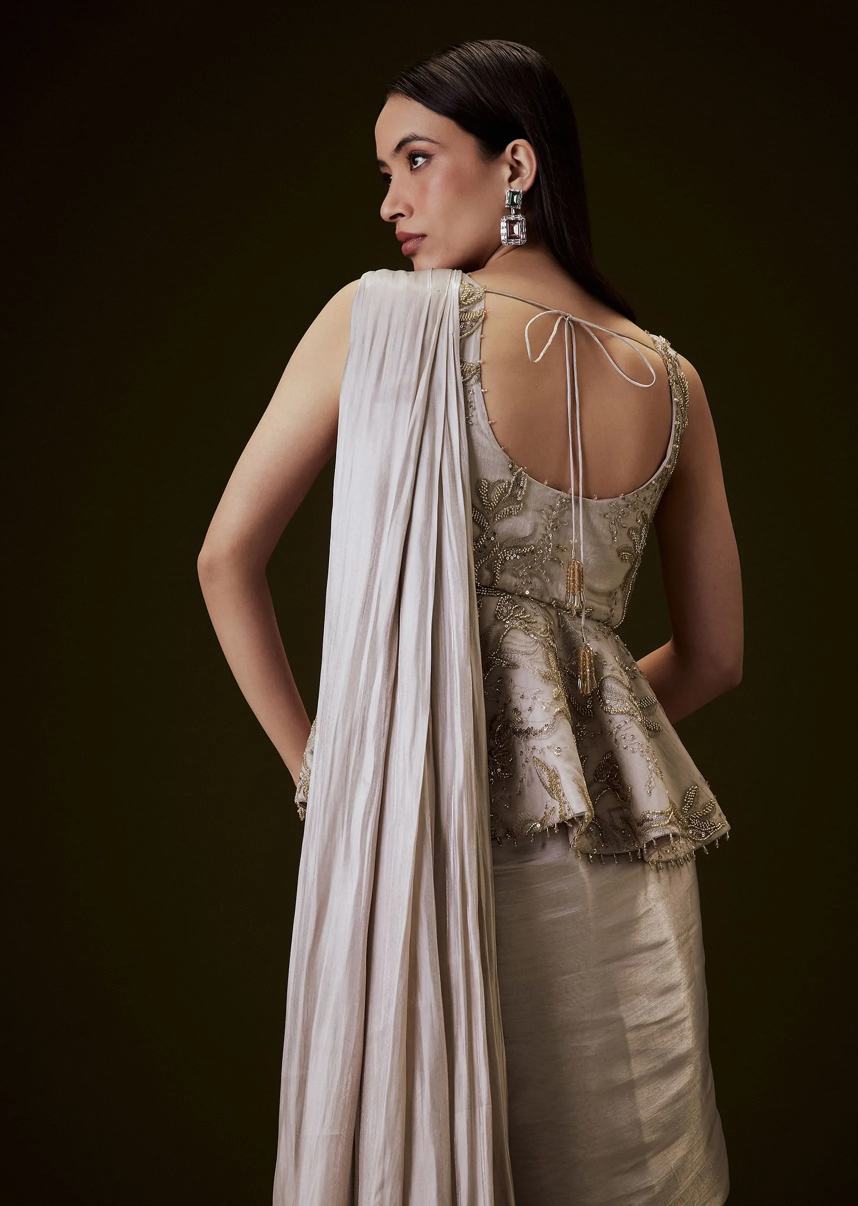 Champion Peach Sequence Embroidered Peplum Top With Saree